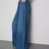 Jeans i bomullsdenim med medelhög midja och vida ben