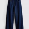 Jeans i bomullsdenim med medelhög midja och vida ben