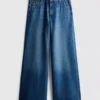 Jeans i bomullsdenim med medelhög midja och vida ben
