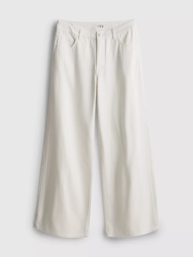 Jeans i bomullsdenim med medelhög midja och vida ben