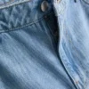 Jeans i bomullsdenim med medelhög midja och vida ben