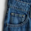 Jeans i bomullsdenim med medelhög midja och vida ben