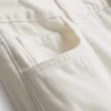 Jeans i bomullsdenim med medelhög midja och vida ben
