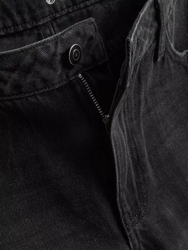 Jeans i bomullsdenim med medelhög midja och vida ben