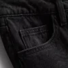 Jeans i bomullsdenim med medelhög midja och vida ben
