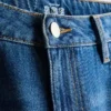 Jeans i bomullsdenim med medelhög midja och vida ben