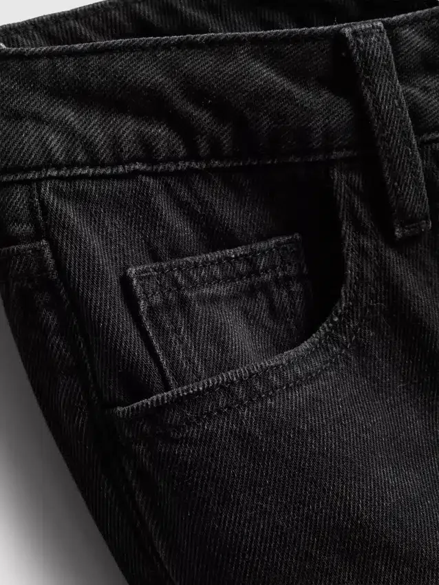 Jeans i bomullsdenim med medelhög midja och vida ben