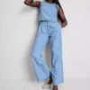 Jeans i bomullsdenim med veck och vida ben