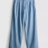 Jeans i bomullsdenim med veck och vida ben