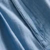 Jeans i bomullsdenim med veck och vida ben