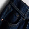 Jeans med medelhög midja, bälten och vida ben