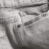 Jeans med medelhög midja och raka ben