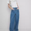 Jeans med vid ben och fickor fram