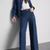 Jeans med vid ben och fickor fram