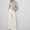 Jeans med vid ben och fickor fram