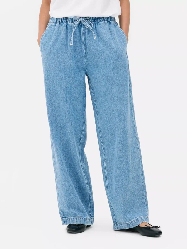 Jeansbyxor med medelhög midja