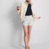 Jeansshorts med medelhög midja och uppvikt kant
