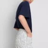 Jeansshorts med medelhög midja och uppvikt kant