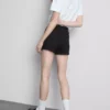 Jeansshorts med medelhög midja och uppvikt kant