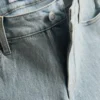 Jeansshorts med medelhög midja och uppvikt kant