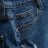 Jeansshorts med medelhög midja och uppvikt kant
