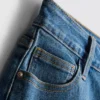 Jeansshorts med medelhög midja och uppvikt kant