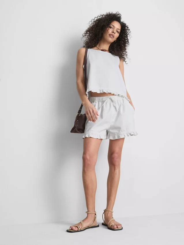 Jeansshorts med volang i nederkanten