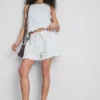 Jeansshorts med volang i nederkanten