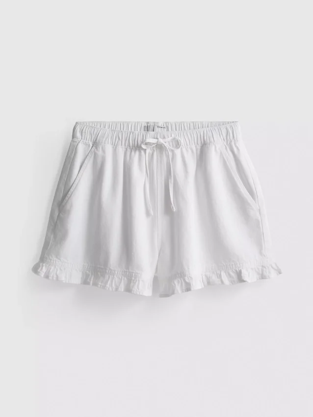 Jeansshorts med volang i nederkanten