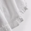 Jeansshorts med volang i nederkanten