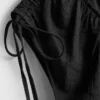 Jumpsuit med V-ringning och ballongben