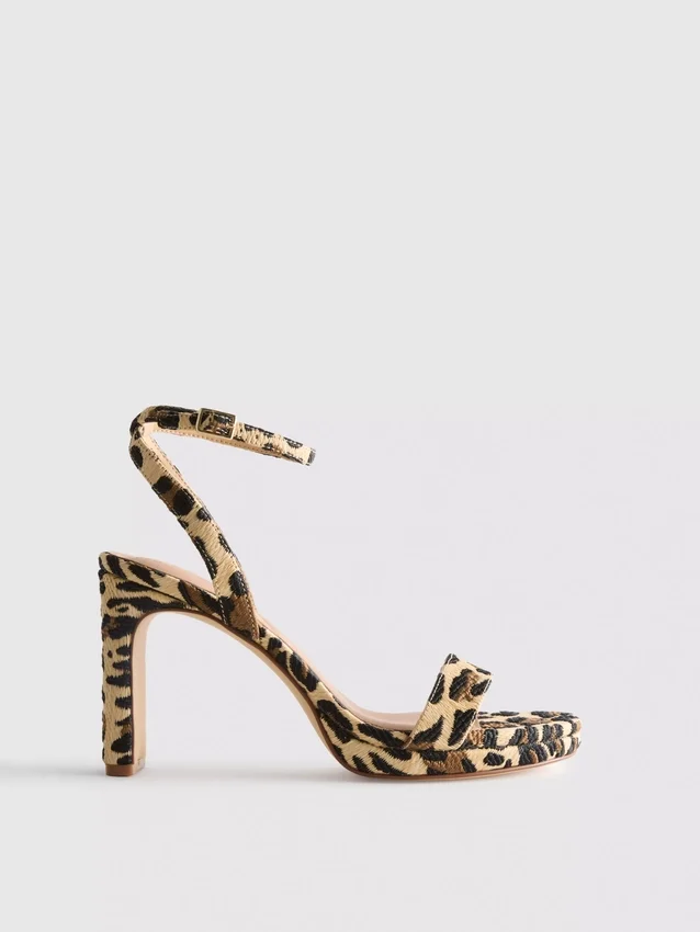 Klackskor med leopardmönster