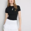 Kort baby-T-shirt med pärlbroderi i bomullsrik kvalitet