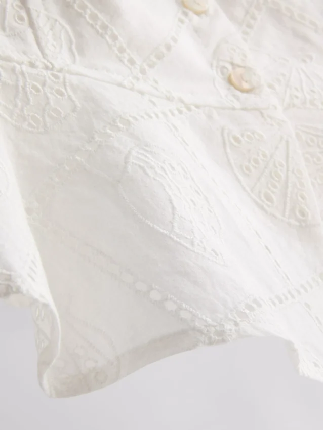 Kort cropped-top i bomull med utskärningar