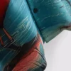Kortärmad skjorta med knappar och flamingomönster
