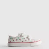 Låga sneakers i canvas med blommönster