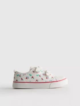 Låga sneakers i canvas med blommönster