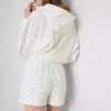 Lösa shorts i bomullsrikt material med blommönster