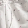 Lösa shorts i bomullsrikt material med blommönster