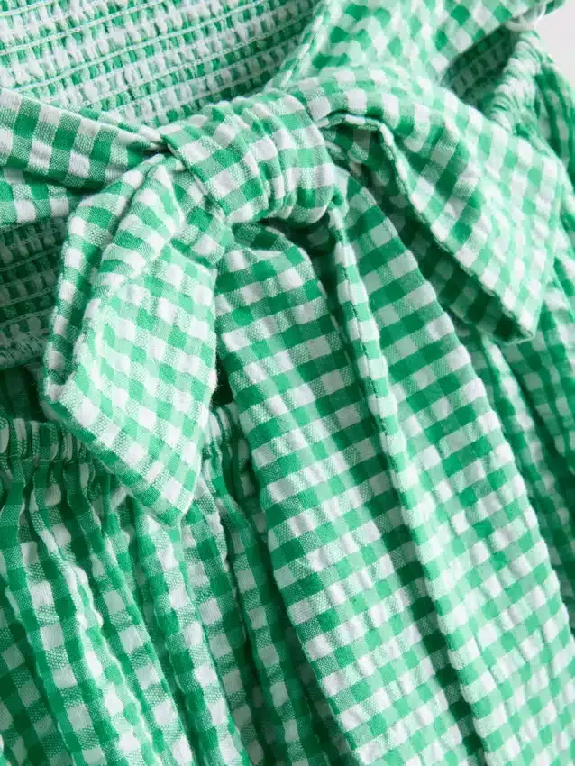 Miniklänning i bomullsgingham med bandeau-top