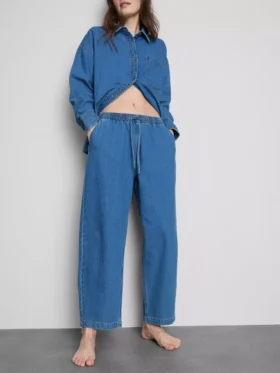 Mjukisbyxor i bomullsdenim med avsmalnande ben