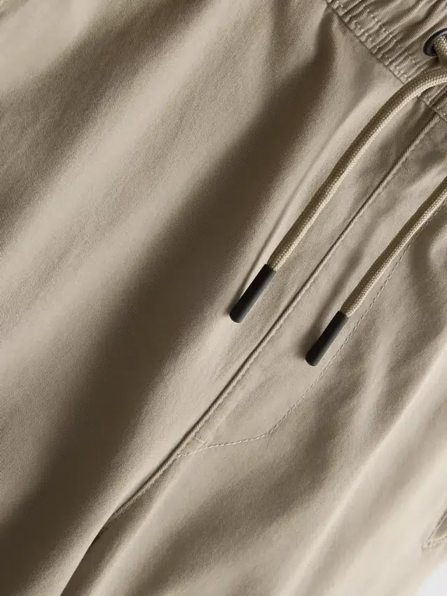 Mjukisbyxor med uppvikt benslut