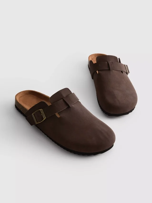 Mule-tofflor med täckt tå