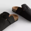 Mule-tofflor med täckt tå