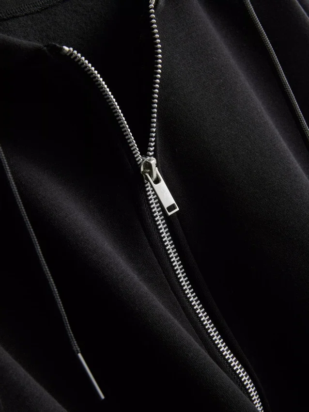 Oumbärlig hoodie med dragkedja