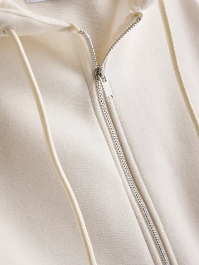 Oumbärlig hoodie med dragkedja