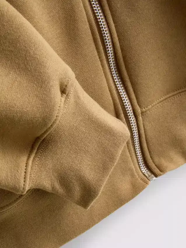 Oumbärlig hoodie med dragkedja