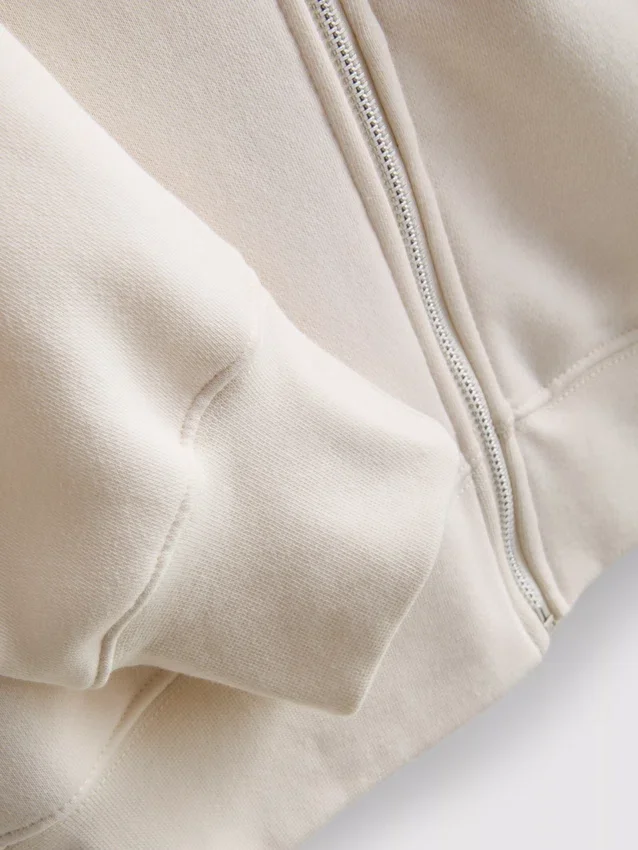 Oumbärlig hoodie med dragkedja
