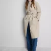 Oumbärlig trenchcoat med bälte