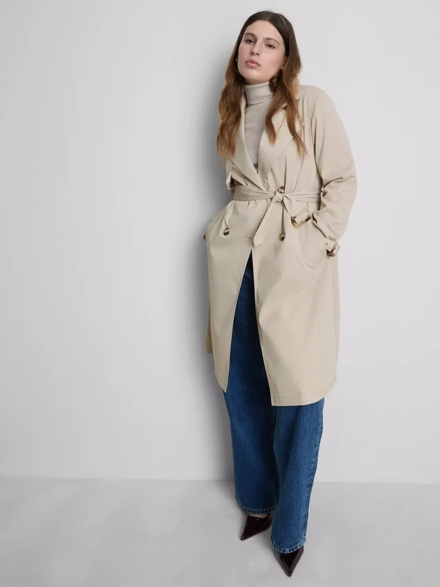 Oumbärlig trenchcoat med bälte